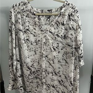 White marbled V neck blouse.